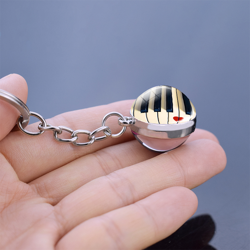 Piano keychain, picture of dam - đánh giá và giá Musical Instrument Glass